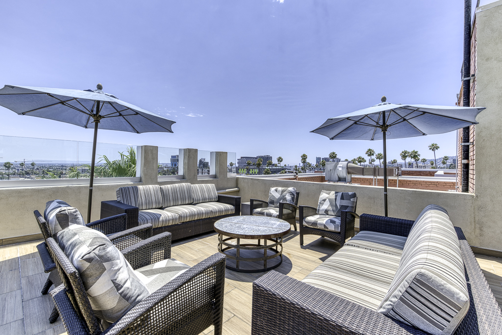 Chef putting the finishing touches on a delicious-looking plate of food